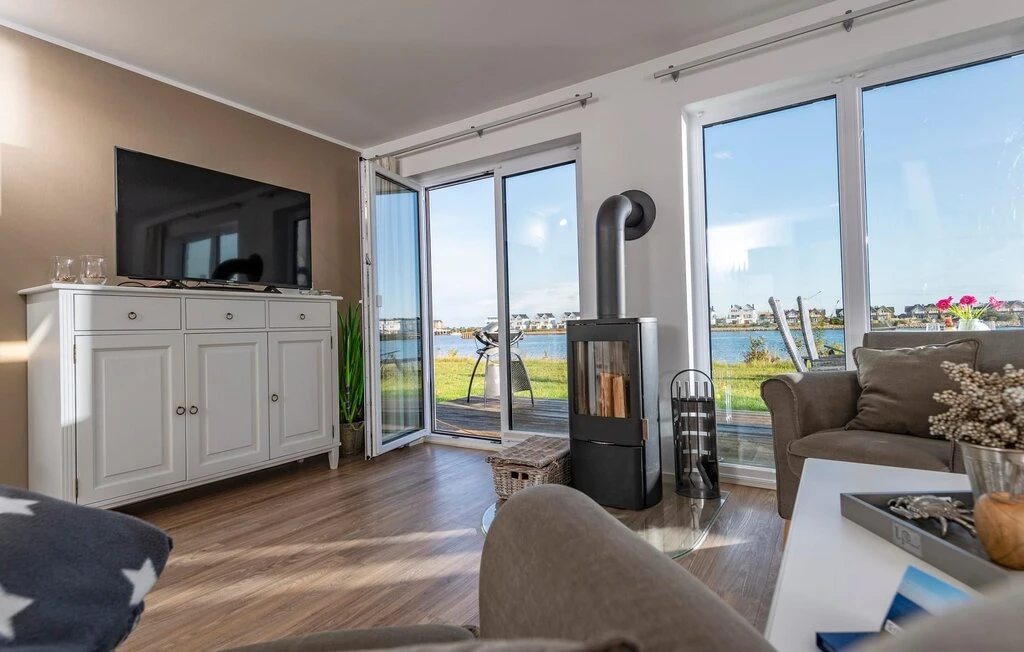 Ferienhaus "Sommer Kajüte" in erster Wasserreihe im OstseeResort Olpenitz 3
